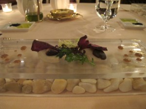 Amuse bouche, on a glass box of stones ...