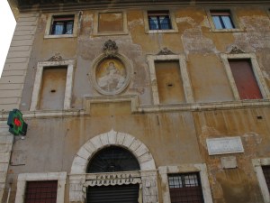 Pharmacy and shrine at Piazza San Bartolomeo All'Isola