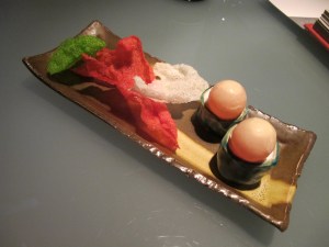 Amuse bouche: campari sphere shooters, with lightly flavored but addictive crisps