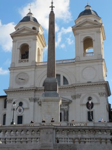 The obelisk at the top of the Spanish Steps.