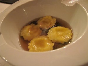 Ravioli in broth.